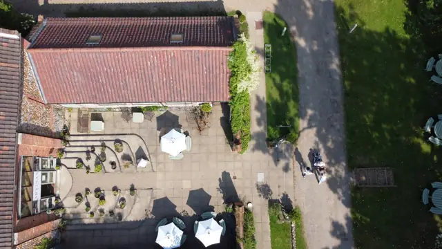 Aerial view of the courtyard and barns
