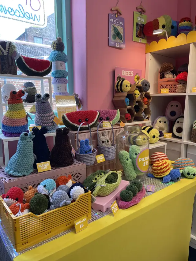 Inside Cult Crochet: shelves of colourful crochet soft toys