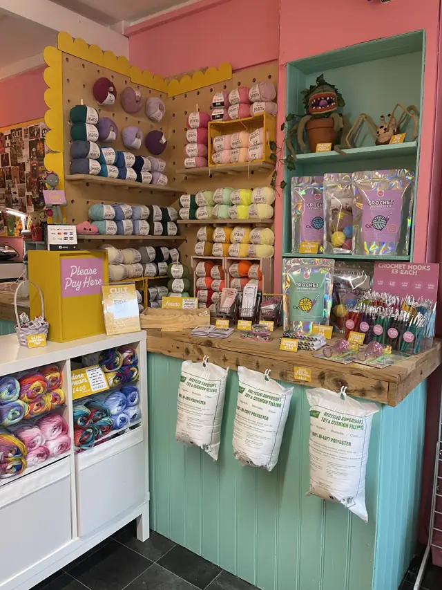 The yarn and accessories corner of the shop